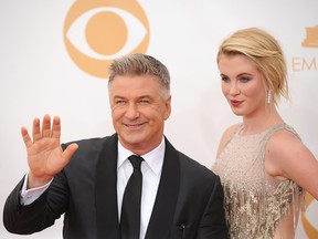 Alec Baldwin and daughter model Ireland Baldwin arrive on the red carpet for the 65th Emmy Awards in Los Angeles on September 22, 2013.