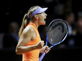Russia's Maria Sharapova reacts after winning 7-5, 6-3 against Italy's Roberta Vinci at the Porsche Tennis Grand Prix in Stuttgart, Germany, Wednesday, April 26, 2017