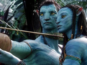 This image released by 20th Century Fox shows the characters Neytiri, right, and Jake in a scene from the 2009 movie "Avatar."