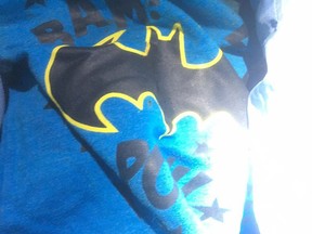 The deceased toddler was wearing this Batman shirt.