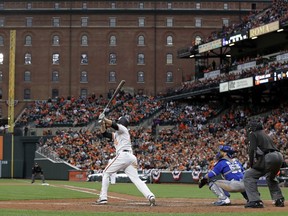 Baltimore Orioles DH Mark Trumbo clubs a walk-off home run against the Toronto Blue Jays on April 3.