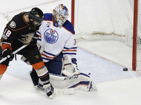 Patrick Eaves of the Anaheim Ducks watches as the puck beats Edmonton Oilers' goaltender Cam Talbot but not the goalpost during Game 2 action in the Western Conference semifinal Friday in Anaheim. Talbot had 39 saves as the Oilers posted a 2-1 win to take a 2-0 stranglehold lead in the series.