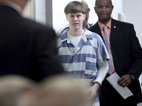 Dylann Roof enters the court room at the Charleston County Judicial Center Monday, April 10, 2017, to enter his guilty plea on murder charges in Charleston, S.C.