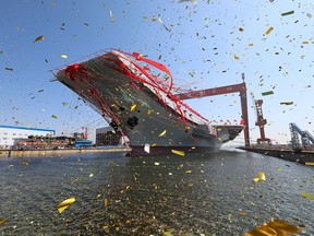 China's first domestically built aircraft carrier is launched at the Dalian shipyard in northeast China's Liaoning Province, April 26, 2017.