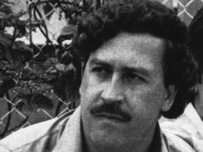 A1983 file photo of Medellin drug cartel boss Pablo Escobar watches a soccer