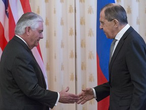 U.S. Secretary of State Rex Tillerson, left, and Russian Foreign Minister Sergey Lavrov shake hands prior to their talks in Moscow, Russia, Wednesday, April 12, 2017