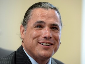 Senator Patrick Brazeau speaks to media as he returns to his Senate office in Ottawa on Thursday, July 14, 2016