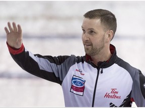 Canada skip Brad Gushue celebrates his win over Sweden in the page 1-2 playoff on April 7.