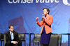 Candidate Andrew Scheer listens to Kellie Leitch speak during the Conservative leadership debate in Toronto on Wednesday April 26, 2017