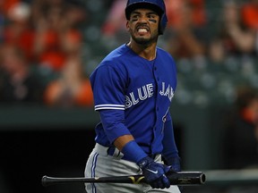 Second baseman Devon Travis of the Toronto Blue Jays reacts after striking out during the first inning against the Baltimore Orioles at Oriole Park at Camden Yards on April 5, 2017 in Baltimore, Maryland.