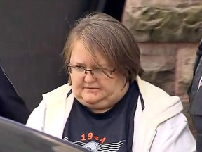Elizabeth Wettlaufer being taken from the courthouse in Woodstock, Ont., in October 2016.