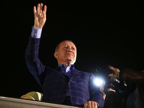 Turkey's President Recep Tayyip Erdogan waves to supporters in Istanbul, Turkey, on Sunday, April 16, 2017. Erdogan declared victory in Sunday's historic referendum that will grant sweeping powers to the presidency, hailing the result as a "historic decision."