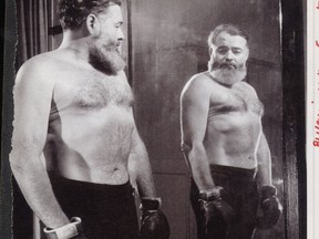 Author Ernest Hemingway ready for a boxing match.