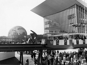 The mini-rail with passengers travel by the USSR Pavilion while the U.S. Pavilion is seen in the background at Expo 67 on April 21 1967.