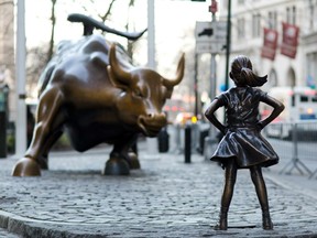 The Charging Bull and Fearless Girl statues are on Lower Broadway in New York. The installation of the bold girl defiantly standing in the bull's path has transformed the meaning of one of New York's best-known public artworks.