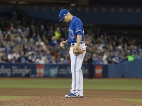 Toronto Blue Jays pitcher Roberto Osuna pauses on the mound in the ninth inning against the Boston Red Sox on Thursday April 20, 2017.