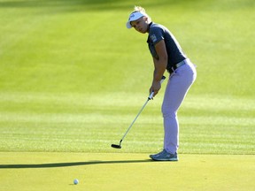 Brooke Henderson of Smiths Falls, Ont. hits a putt during action at the LPGA's ANA Inspiration tournament in Racho Mirage, Calif. Henderson fired a final round 68 to finish in a tie for 14th position overall. Winning the tournament was South Korea's  So Yeon Ryu in a playoff over American Lexi Thompson. Both had finished the regulation 72 holes tied at 14-under and that included a controversial four-stroke penalty levied on Thompson after misplacing her ball on the 17th green during her round Saturday. Thompson wasn't informed of the penalty until the 13th hole in Sunday's final round.