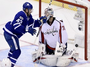 Toronto Maple Leafs centre Nazem Kadri (43) watches the puck go into the net past Washington Capitals goalie Braden Holtby (70) during second period NHL hockey round one playoff action in Toronto on Wednesday, April 19, 2017.