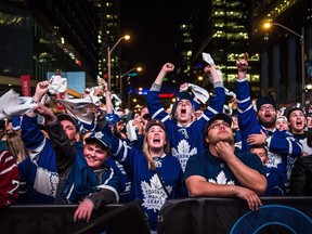 Fans at Maple Leaf Square react to a third-period goal in Game 6 between the Toronto Maple Leafs and Washington Capitals on April 23.