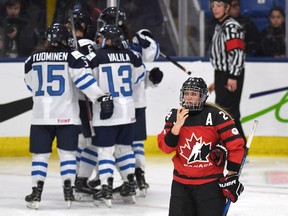 Canada's Natalie Spooner looks up at the scoreboard after a Finland goal at the world hockey championships on April 1.