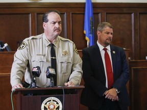 Wagoner County Sheriff Chris Elliott speaks to media about Elizabeth Rodriguez, the getaway driver in a failed burglary resulting in the death of three, at the Wagoner County Courthouse on Monday, April 3, 2017, in Wagoner, Okla. Rodriguez told television reporters that she feels guilty, but not responsible for their deaths and that she has little compassion for the man who shot them.