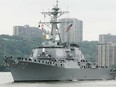 The USS Mahan, a guided-missile destroyer, moves up the Hudson River in New York on May 26, 2004.