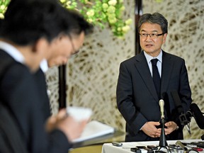Joseph Yun, right, answers questions from reporters following meeting with Japanese and South Korean chief nuclear negotiators to talk about North Korean issues on April 25, 2017.