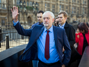 A glum-looking Jeremy Corbyn walks towards the Houses of Parliament in London on June 24, 2016 — the day after the Brexit referendum.