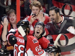 Ottawa Senators centre Jean-Gabriel Pageau (44) celebrates his game-winning goal with teammate Mike Hoffman during the second overtime period of Game 2 against the New York Rangers on Saturday, April 29, 2017.