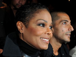 Janet Jackson and Wissam Al Mana arrive for the Lanvin Ready to Wear Spring/Summer 2011 show during Paris Fashion Week at Halle Freyssinet on October 1, 2010 in Paris, France.