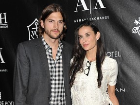 Kutcher and Moore in 2011.