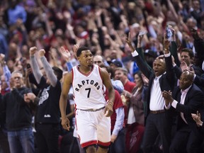 In this April 18 file photo, Kyle Lowry celebrates a late basket against the Milwaukee Bucks.