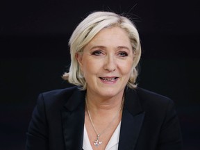 French presidential election candidate for the far-right Front National (FN) party Marine Le Pen waits before an interview on the set of the France 2 TV channel on April 24, 2017 in Paris.
