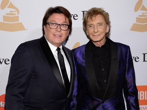 Garry Kief (L) and Barry Manilow attend the 2016 Pre-GRAMMY Gala and Salute to Industry Icons honoring Irving Azoff at The Beverly Hilton Hotel on February 14, 2016 in Beverly Hills, California.