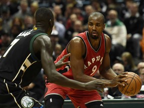 Serge Ibaka of the Toronto Raptors looks to make a play with the ball while being defended by Milwaukee Bucks' Thon Maker during Game 3 action in their East Conference quarter-final Thursday in Milwaukee. The Bucks won big, 104-77, to take a 2-1 edge in the series.
