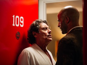 Ian McShane as Mr. Wednesday, and Ricky Whittle as Shadow.