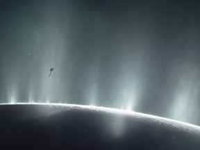 This illustration shows Cassini diving through the Enceladus plume in 2015. New ocean world discoveries from Cassini and Hubble will help inform future exploration and the broader search for life beyond Earth.