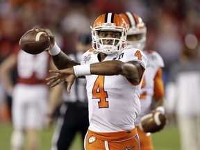 In this Jan. 9 file photo, NFL QB prospect Deshaun Watson warms up for Clemson before the NCAA championship game.
