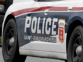 A police car in Saint-Jean-sur-Richelieu near Montreal on Monday October 20, 2014.