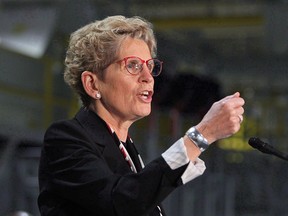 Ontario Premier Kathleen Wynne speaks at the Ford Essex Engine Plant in Windsor, Ont. File photo.