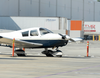 A small airplane sits in a warehouse parking lot Tuesday morning, April 4, 2017,  in Whittier, Calif., the day after the pilot, Darrell Roberts, made an emergency landing.