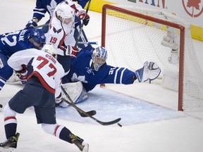 Maple Leafs goalie Frederik Andersen tries in vain to make the save on T. J. Oshie, who opened the scoring for the Washington Capitals during the first period of Game 4 of their first-round playoff series at the Air Canada Centre in Toronto on Wednesday night.