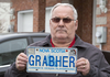 Lorne Grabher with his personalized GRABHER licence plate which was revoked in Nova Scotia.