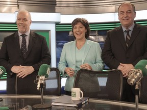 NDP leader John Horgan, BC Premier Christy Clark and Green Party leader Andrew Weaver in action during the provincial party leaders' debate at City TV in Vancouver, BC., April 20, 2017.