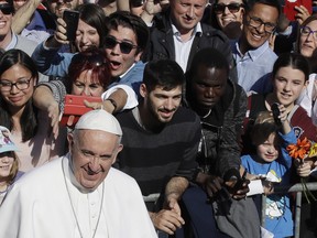 Pope Francis arrives to the Basilica of St. Bartholomew in Rome, Saturday, April 22, 2017.