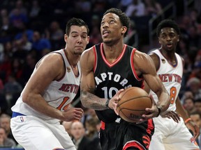DeMar DeRozan, centre, drives to the basket against the New York Knicks on April 9.