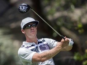 Graham DeLaet watches his drive down the second fairway at the RBC Heritage in Hilton Head Island, S.C., on April 16.