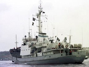 In this file photo taken on Friday, April 2, 1999, Russian Navy reconnaissance frigate Liman leaves from the Black Sea fleet's base at Sevastopol, Crimean peninsula