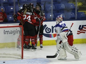 Russia goalie Maria Sorokina skates back to the net after giving up a goal to Canada forward Brianne Jenner during the third period of a IIHF Women's World Championship hockey tournament game,