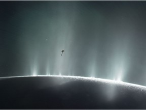 This illustration shows NASA's Cassini spacecraft diving through the plume of Saturn's moon Enceladus, in 2015.
